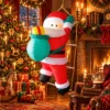 LED figura Deda Mraz na merdevinama na naduvavanje sa belim svetlom za vedru božićnu dekoraciju