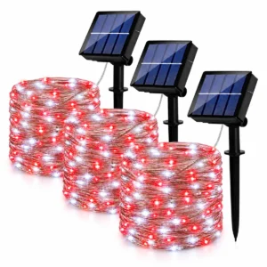 Crveno-bele solarne LED lampice 30m daju tradicionalan praznični izgled ogradi, pergoli i zelenilu