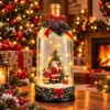 lampa_sa_deda_mrazom_svetlucavim_snegom_muzikom Novogodišnja lampa sa muzikom i LED osvetljenjem u obliku flaše, visine 29 cm i širine 11 cm