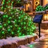 zeleni_solarni_svetleci_niz_za_praznike Solarni niz sa 300 lampica pruža 30 metara zelenog LED svetla za veliko praznično dvorište